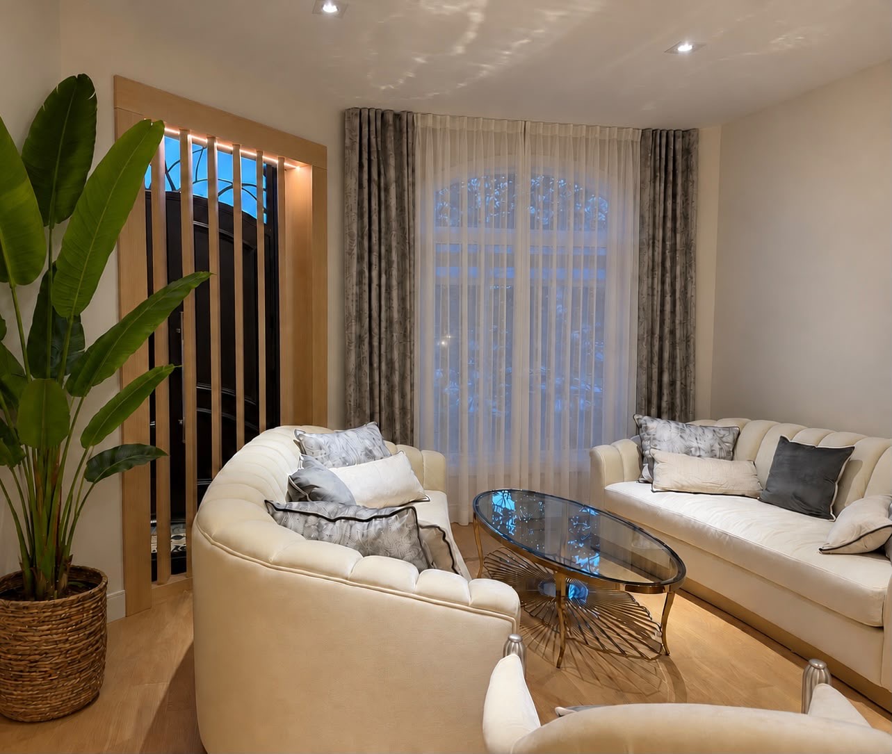 Custom drapery and sheers in a warm living room
